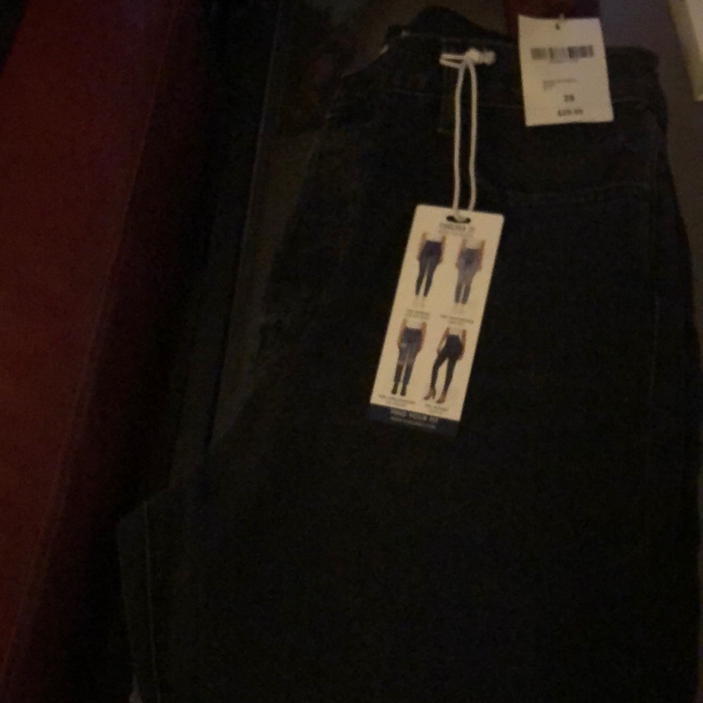 Brand new distressed black jeans